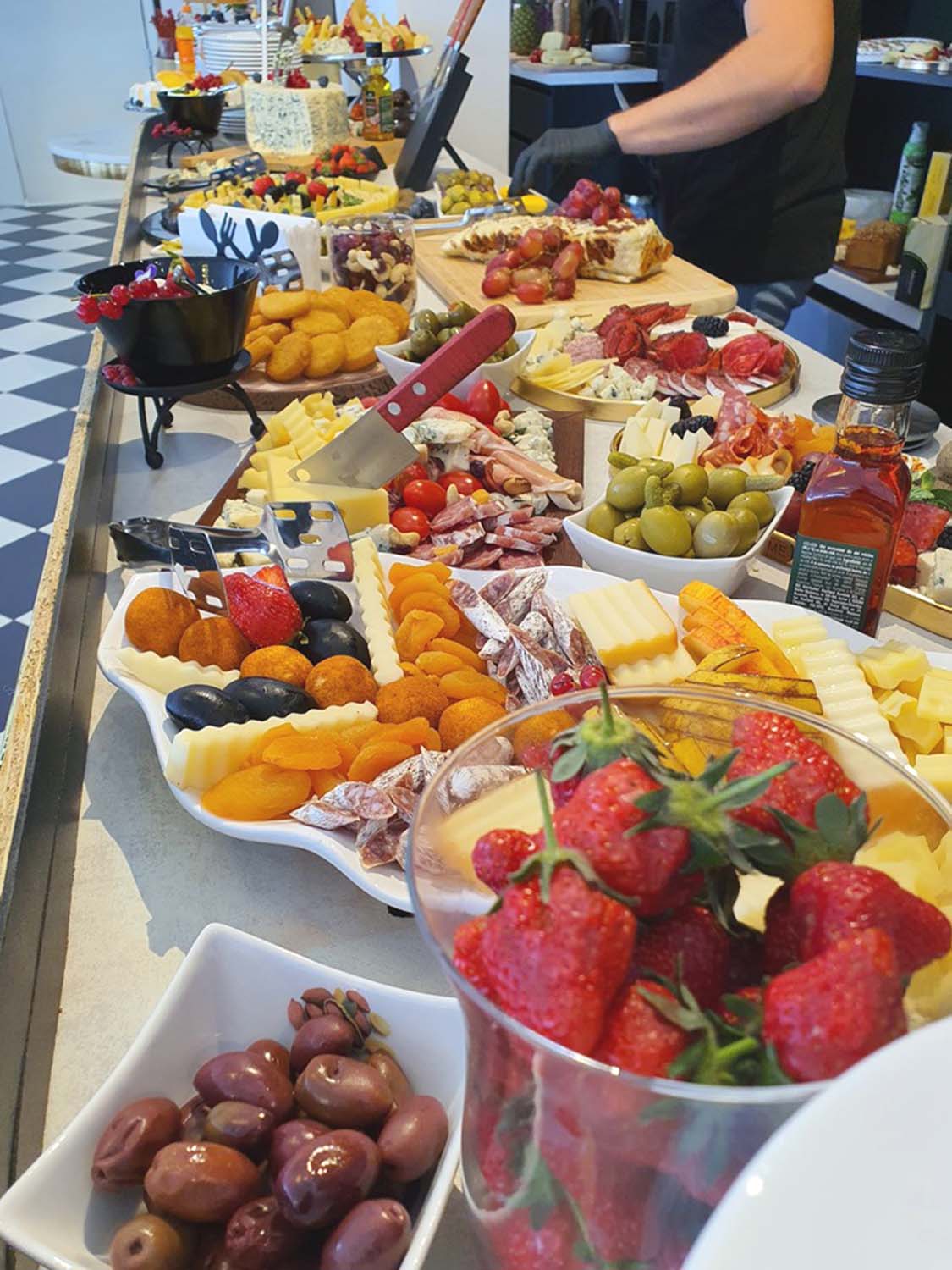 A buffet with a lot of food on it in Sibiu.