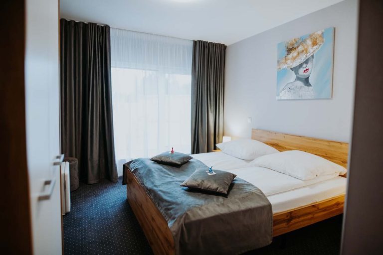 Hotel room with a painting.