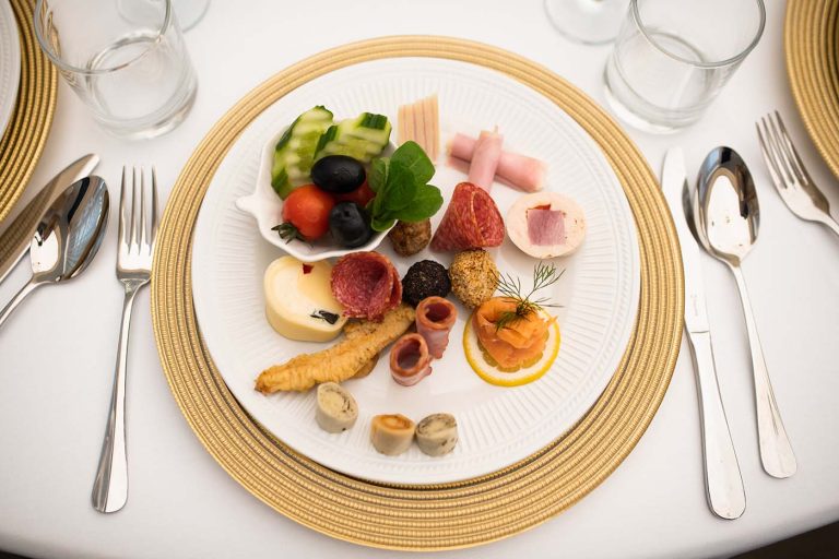 A plate with a variety of food on it.
